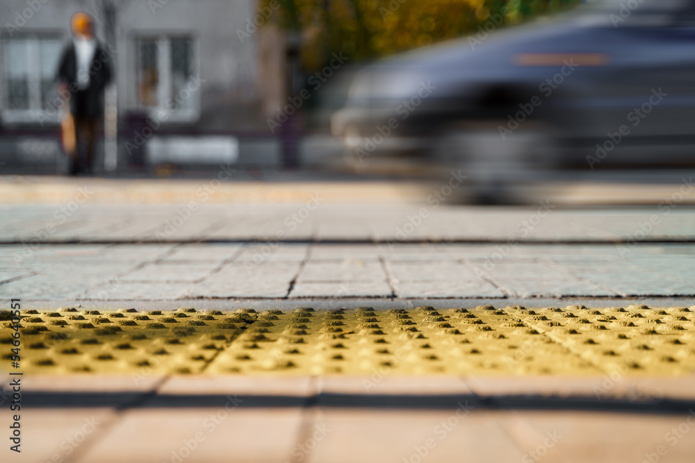 Tactile tiles for self-orientation while moving through the streets of the city