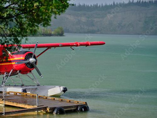 Cuadro en lienzo Red seaplane float plane after a thunderstorm in the town of Whitehorse in the y