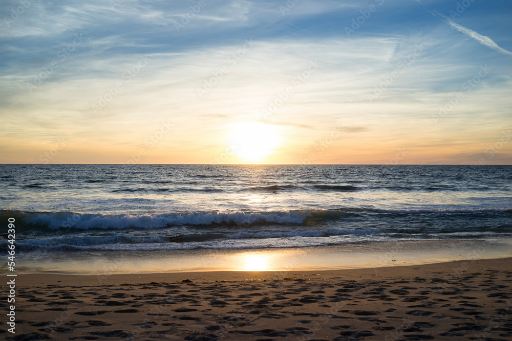 Scenic view of sea against cloudy sky during sunset Scenic view of sea against cloudy sky during sunset
