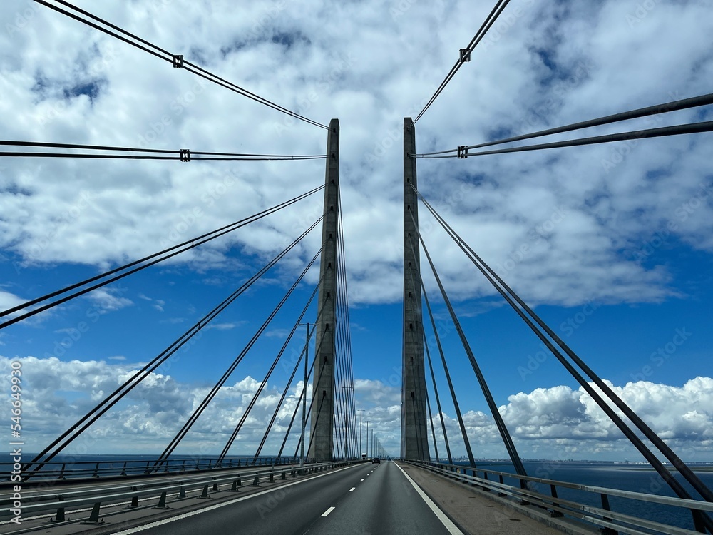 Naklejka premium Highway empty bridge, asphalt bridge, blue sky with white clouds