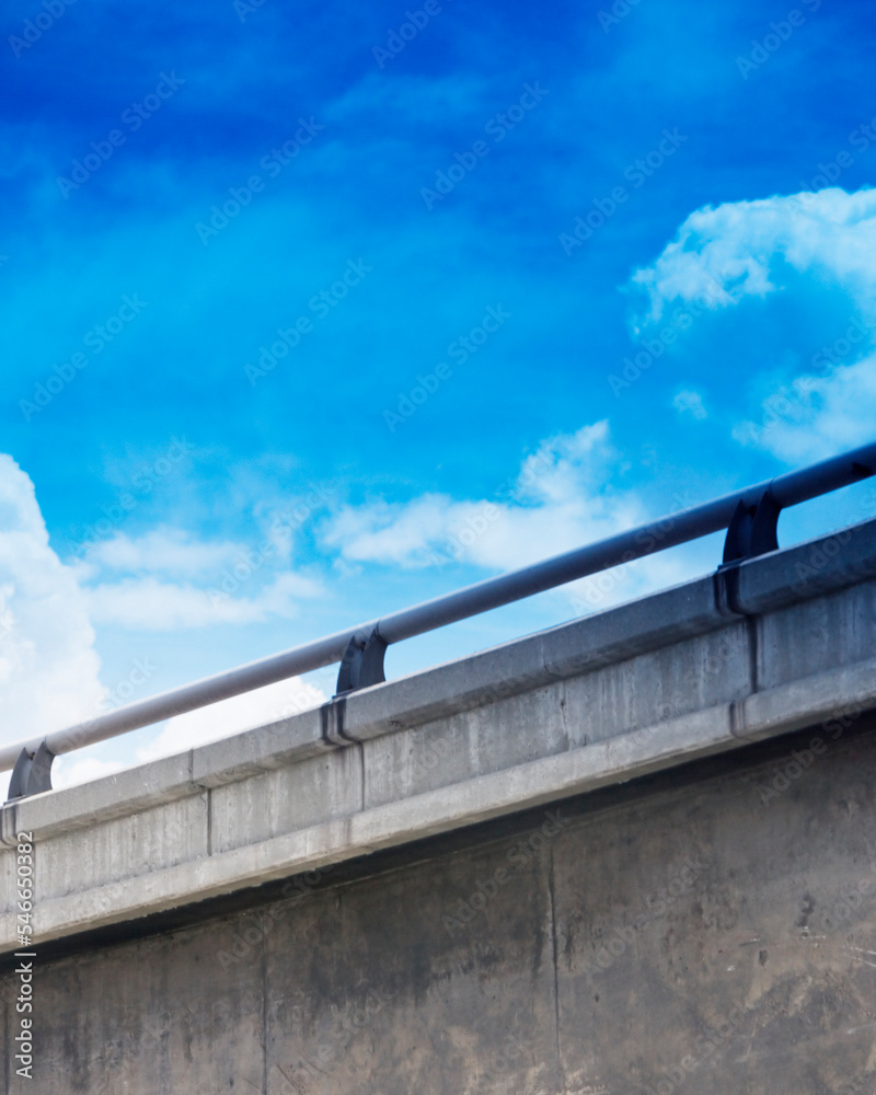 Low angle view of a concrete automobile overpass. Low angle view of a concrete automobile overpass.