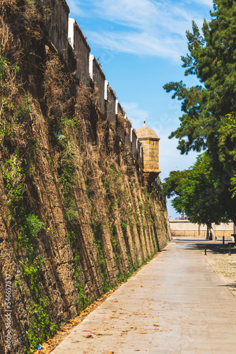 Anciant city wall with fortifications in the old city of Cádiz, Andalusia, Spain photo