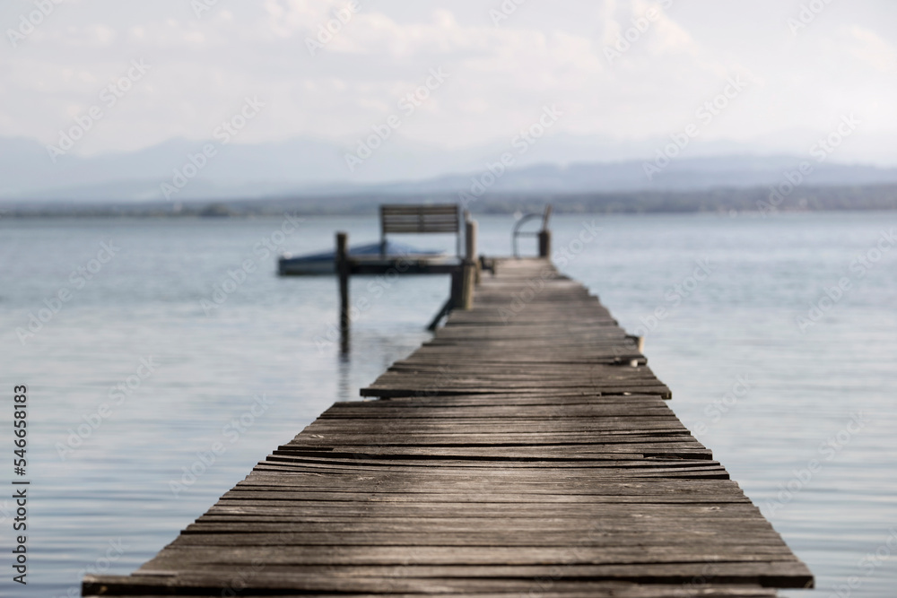 Boardwalk on the lake at sunset, Bavaria, Germany Boardwalk on the lake at sunset, Bavaria, Germany