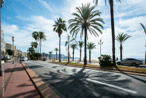 Auto road of Promenade des Anglais in Nice town with fantastic Palm trees in summer!