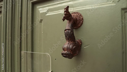 Forged door handle. Door decor door handle. Salvador Dali Museum in Figueres, Spain. The Dali Theater Museum in Figueres. Museum of the surrealist painter Salvador Dali in Figueres, Catalonia. photo