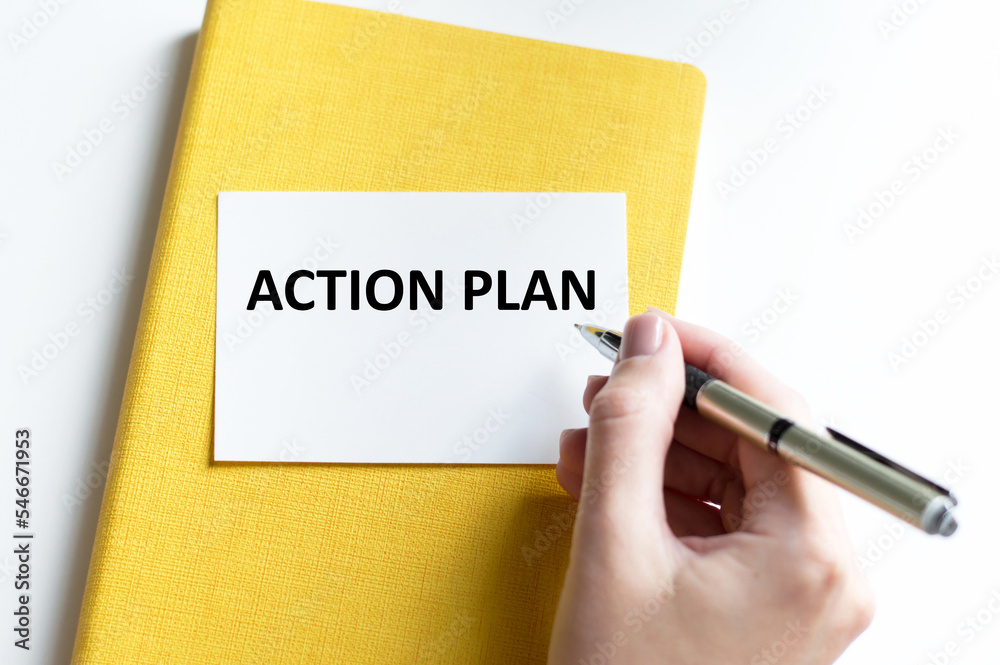 a white card with the text ACTION PLAN a white card with the text ACTION PLAN