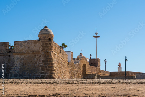 This the Bastion of  OrejÛn, one of the bastions build for the defense of La Caleta. Next to it is the buste of Paco Alba, one of the 'fathers' for modern day Carnaval in C·diz photo