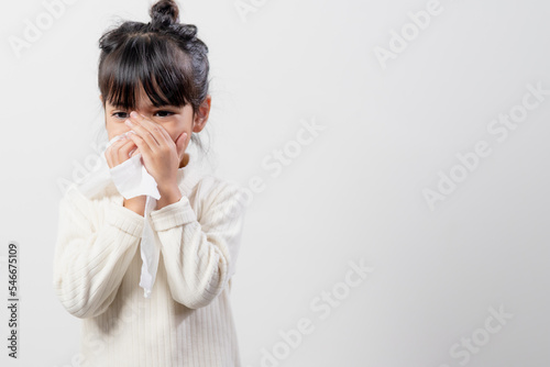 Canvas Print Asian child girl sick with sneezing on the nose and cold cough on tissue paper b