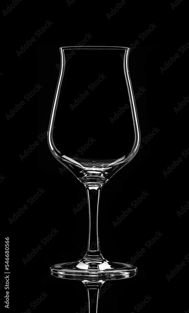 Wine glass. Empty on a black background. Outline. Wine glass. Empty on a black background. Outline.