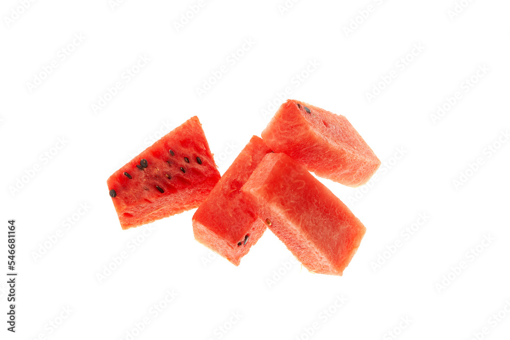 Watermelon pieces on white background, close-up, selective focus. Sugary watermelon pulp cubes with seeds Watermelon pieces on white background, close-up, selective focus. Sugary watermelon pulp cubes with seeds