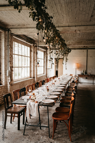 Bohemian Wedding Tablle with flowers and string lights photo