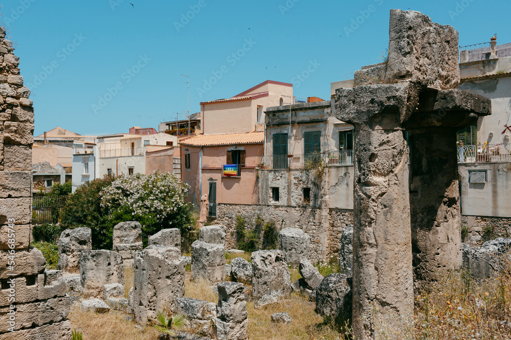 Ruins and houses with rainbow flag in old city of Siracusa, in Sicily Ruins and houses with rainbow flag in old city of Siracusa, in Sicily
