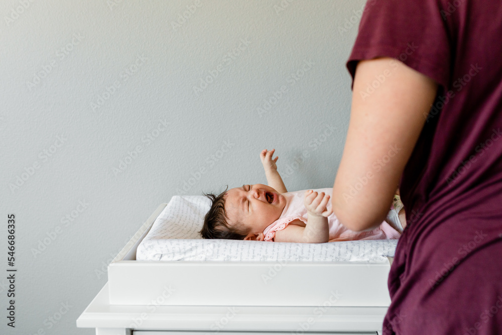 Infant Cries During A Diaper Change Stock Photo Adobe Stock