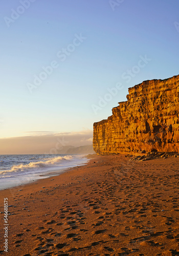 Obraz na plátně Beach and cliffs at the sunset, Hive Beach in Dorset