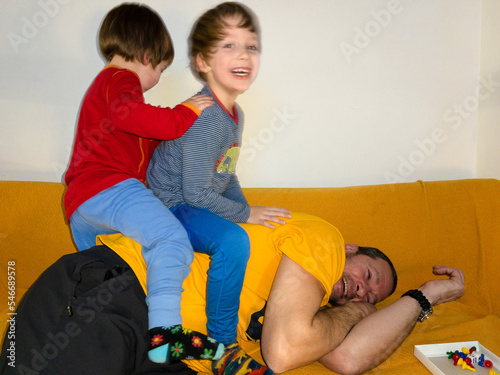 A father play with his kids