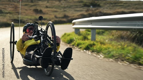 Athlete with disability training with His Handbike on a Track. High quality 4k footage photo