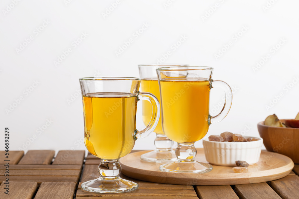 apple cider on a wooden table apple cider on a wooden table