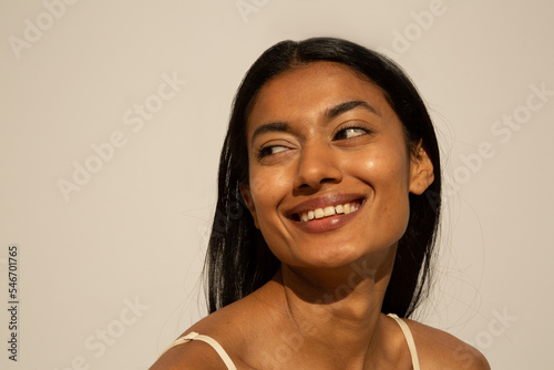 Candid smiling portrait wite seamless background photo