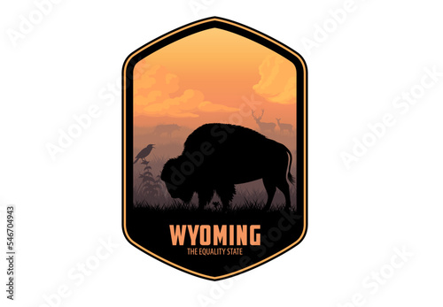 Wyoming vector label with buffalo bison and western meadowlark photo
