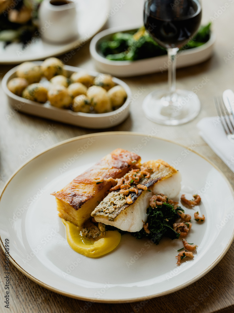 White fish pan fried with potato Stock Photo | Adobe Stock