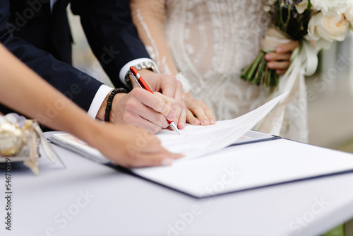 Anonymous newlywed sign wedding ceremony 