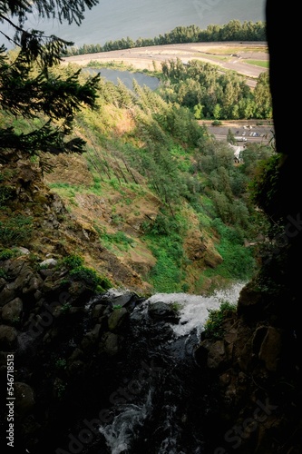 Vertical shot of the Benson Bridge over Multnomah Falls during the day photo