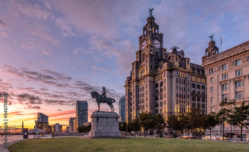 Royal Liver Building and the Museum in Liverpool, image captured at sunset in the city center downtown docklands