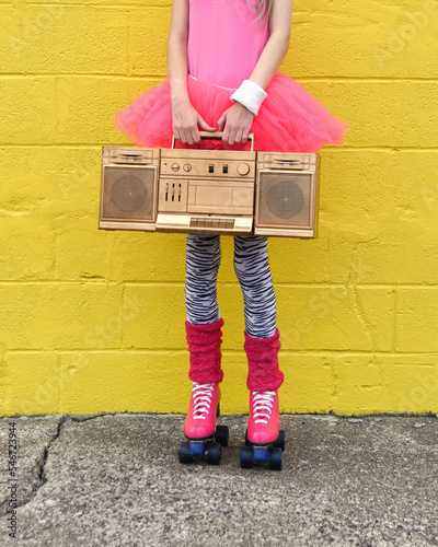 80s Girl Holding Stereo and Roller Skates