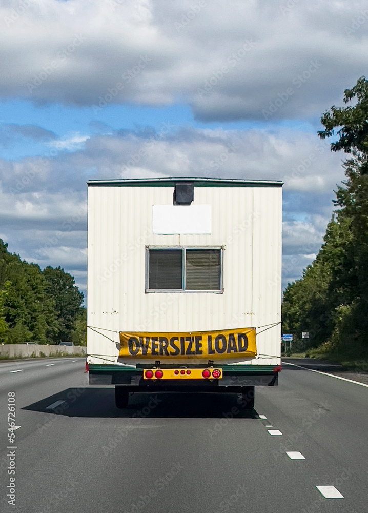 UGC of Oversize load hauled by truck on highway UGC of Oversize load hauled by truck on highway