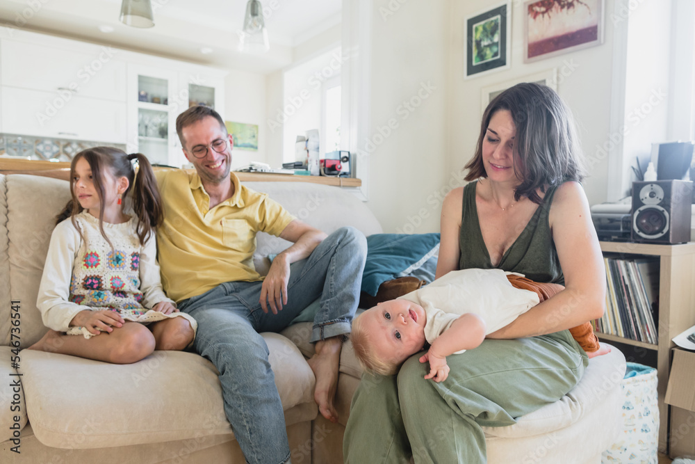 Family with two children indoors Family with two children indoors