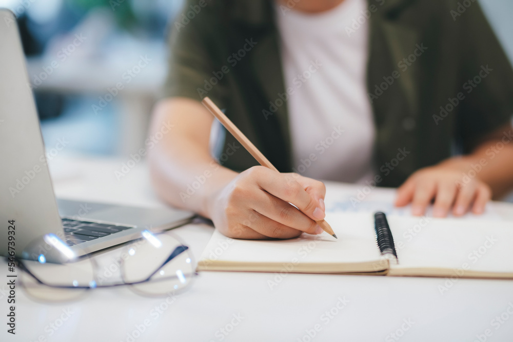 Close up of Businesswoman working at office using laptop. Close up of Businesswoman working at office using laptop.