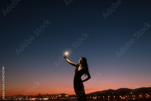 Happy woman enjoying taking selfies 