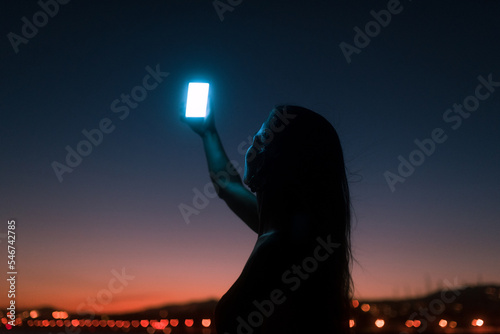 Woman looking for internet connection photo