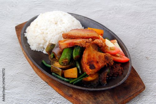Freshly cooked Filipino food called Pakbet with Lechon Kawali and rice