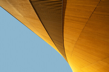 Elegant and abstract modern building exterior against blue sky