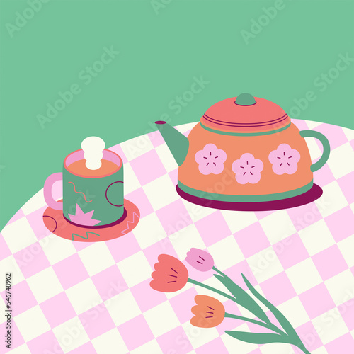 Kettle, Cup and cake of tea on the table. photo