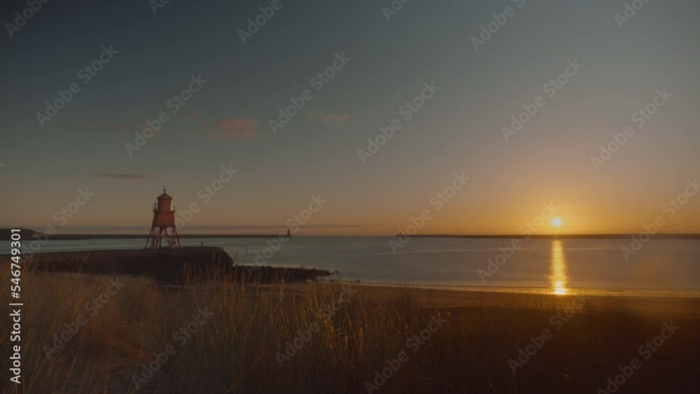 South Shields wide angle at sunrise. Herd Groin Lighthouse framed on the left hand side of the frame. South Shields wide angle at sunrise. Herd Groin Lighthouse framed on the left hand side of the frame.
