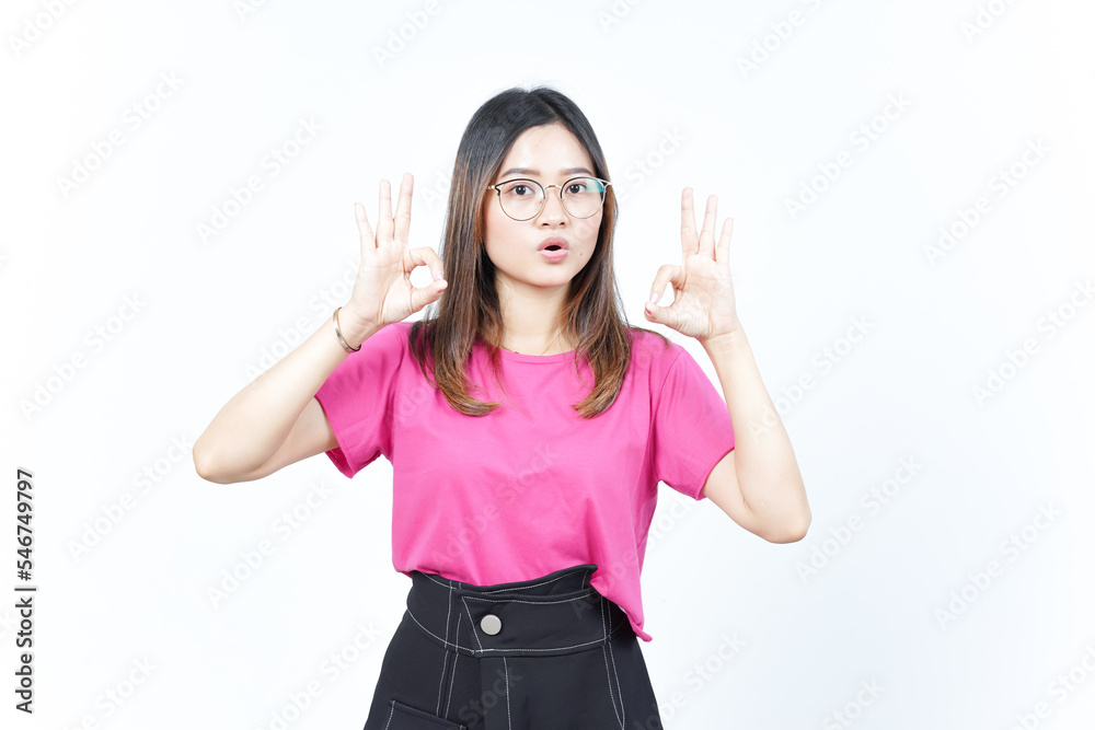 Showing OK Sign Of Beautiful Asian Woman Isolated On White Background Showing OK Sign Of Beautiful Asian Woman Isolated On White Background