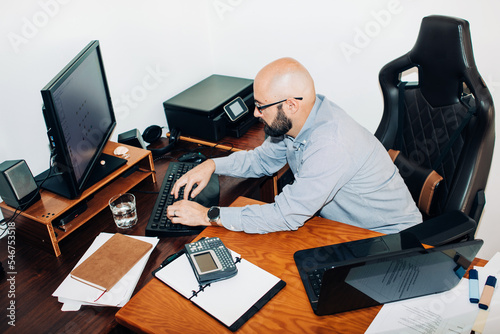 Male engineer working on desktop computer