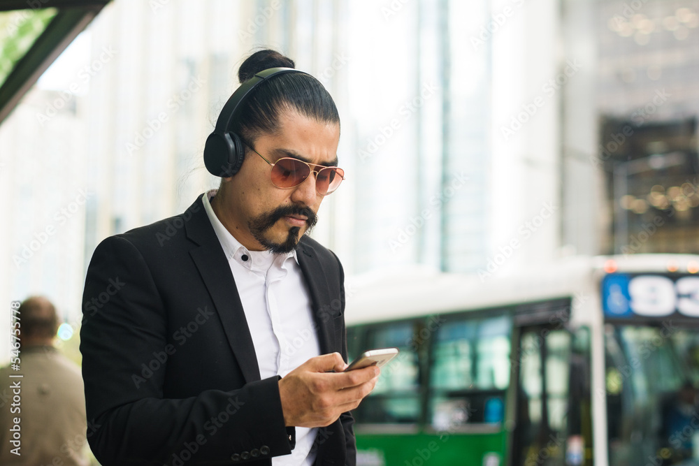 Business man commuting to work in a big city Business man commuting to work in a big city