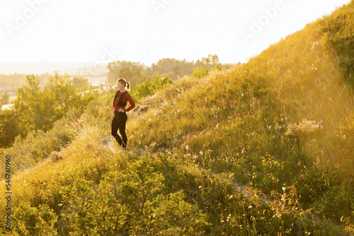 Trail Runner Rests And Takes In View photo