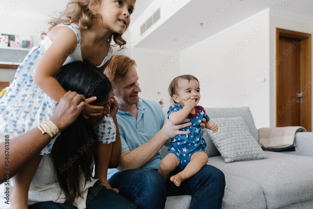 A family on the couch at home A family on the couch at home