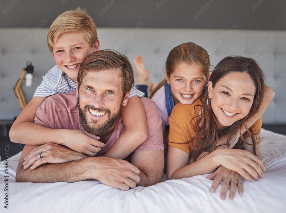 Happy, relax and portrait of family in bedroom for bonding, support and smile together. Affection, playful and weekend with parents and children at home for natural, rest and embrace in the morning Happy, relax and portrait of family in bedroom for bonding, support and smile together. Affection, playful and weekend with parents and children at home for natural, rest and embrace in the morning