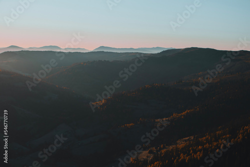 Beautiful mountains view in the morning. Autumn foggy landscape