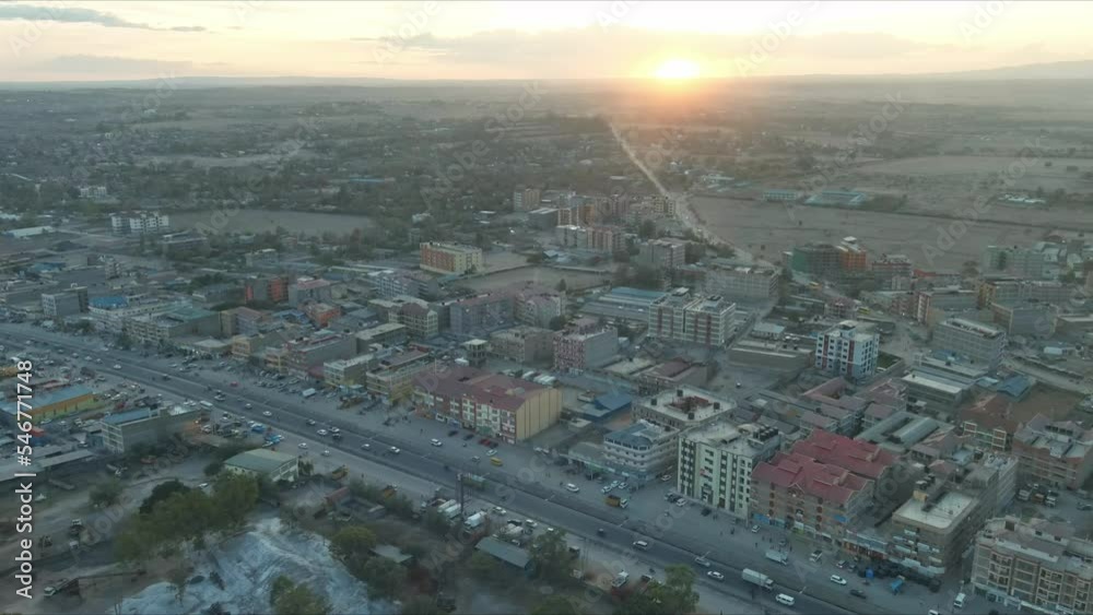 Aerial View Of Sprawling African Town In Kenya, sunset horizon Aerial View Of Sprawling African Town In Kenya, sunset horizon