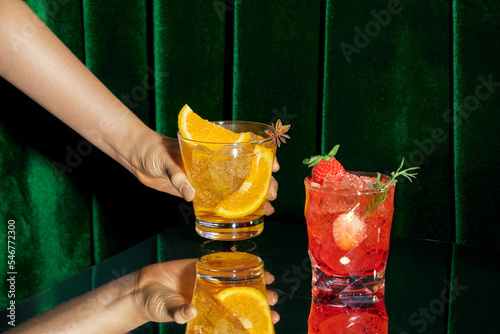 summer cocktail with fresh berries and fruits