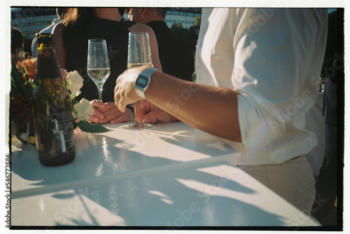 Elegant hi-end couple dating in sophisticated restaurant photo