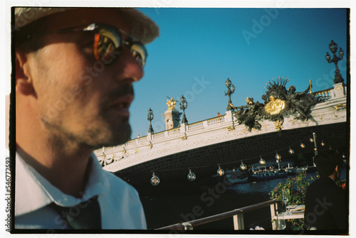 Candid moment traveling on boat in Paris