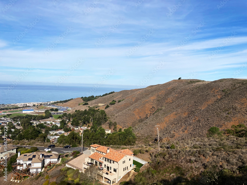 Scenic aerial view of Sharp Park residential neighborhood and Milagra Ridge in Pacifica, California from Pacifica Vista Point at Sharp Park Road.
