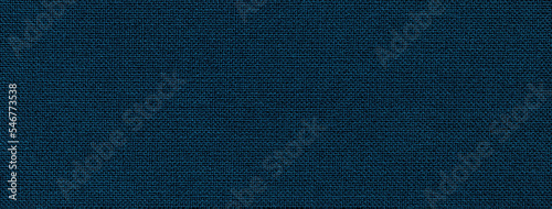 Fotografie, Obraz Texture of navy blue color background from textile material with wicker pattern